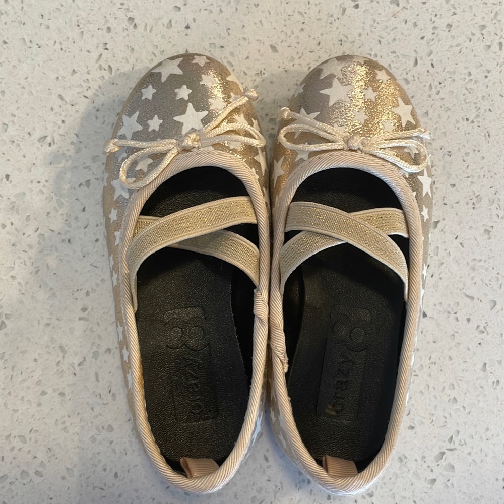 Excellent condition. My daughter wore them once or twice.